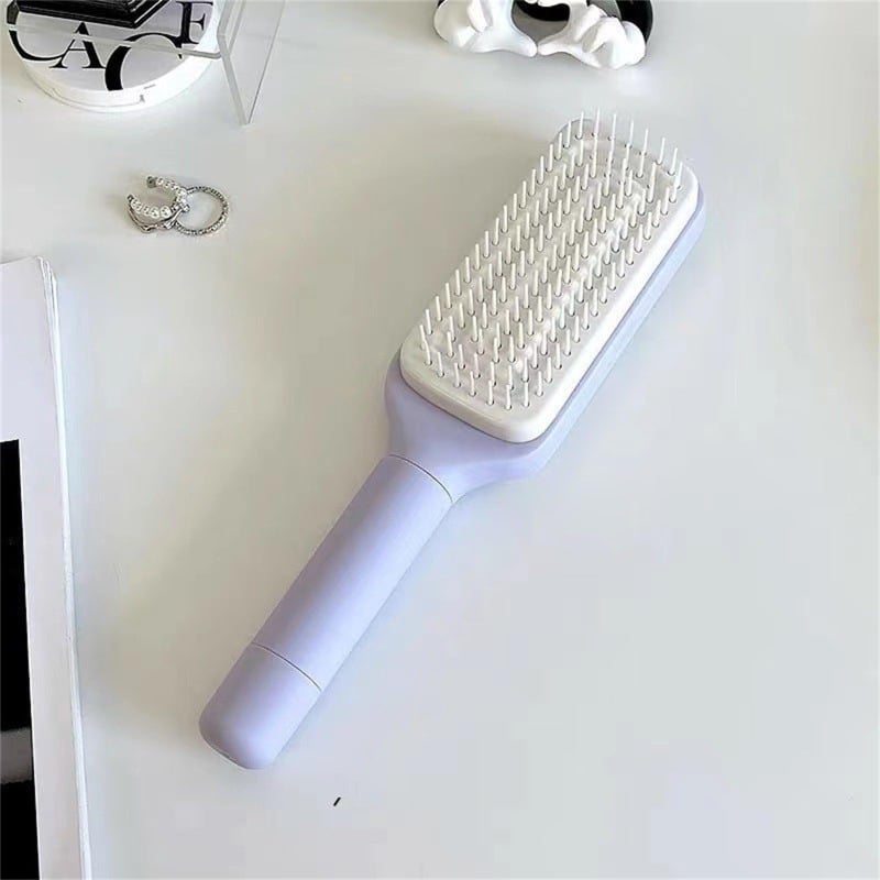 CleanBrush™ – Roterende zelfreinigende haarborstel | 1+1 GRATIS